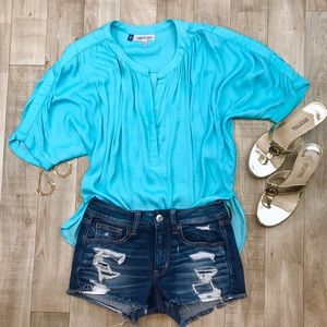 Jennifer Lopez aqua blouse size S